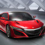 Honda NSX 2015 le retour de la belle en après 10 ans d'absence forte d'un moteur hybride de 550 ch avec un V6 biturbo, une voite de vitesse à 9 rapports et une carrosserie futuriste.